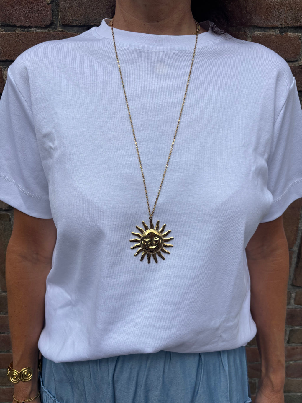 Lange ketting zon